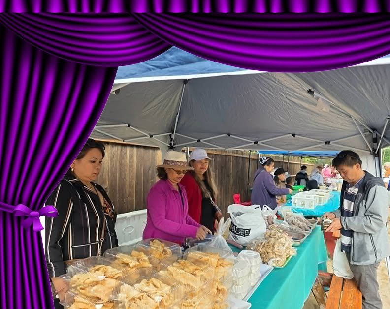People at a temple food stall under a tent, with trays of fried snacks and a purple curtain